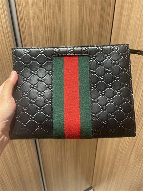 gucci mens portfolios|gucci men clutch.